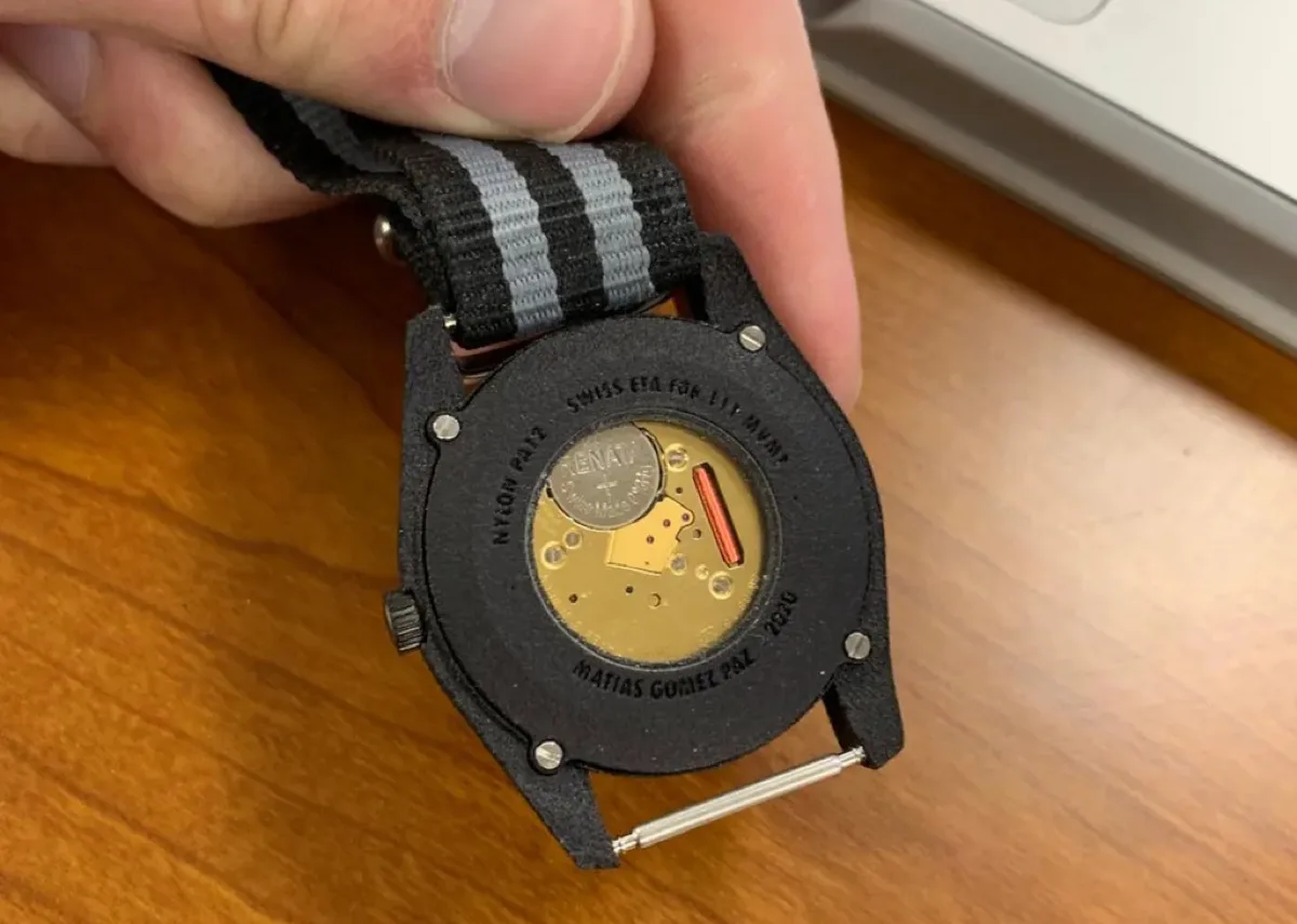 Back of the GP MK-1 showing the ETA quartz movement through a mineral-glass window